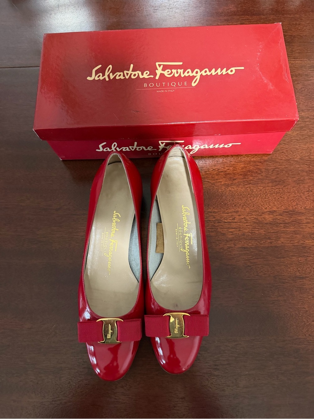 Salvatore Ferragamo Red Patent Vara Pumps with Gold Accent